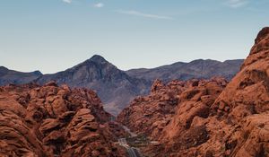 Preview wallpaper rocks, mountains, road, winding, sandy