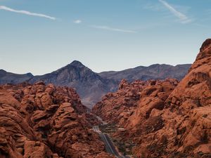 Preview wallpaper rocks, mountains, road, winding, sandy