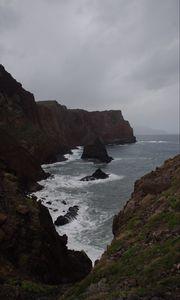 Preview wallpaper rocks, mountains, sea, surf, storm