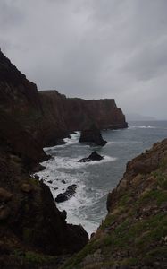 Preview wallpaper rocks, mountains, sea, surf, storm