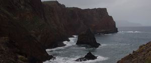 Preview wallpaper rocks, mountains, sea, surf, storm