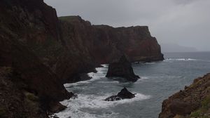 Preview wallpaper rocks, mountains, sea, surf, storm