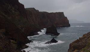 Preview wallpaper rocks, mountains, sea, surf, storm