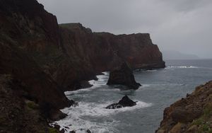 Preview wallpaper rocks, mountains, sea, surf, storm