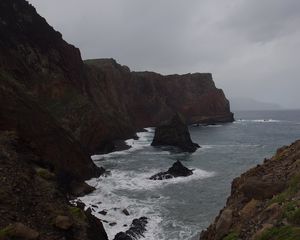 Preview wallpaper rocks, mountains, sea, surf, storm