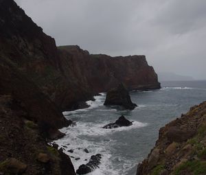 Preview wallpaper rocks, mountains, sea, surf, storm