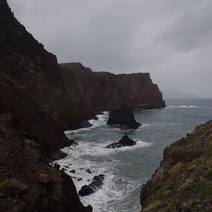 Preview wallpaper rocks, mountains, sea, surf, storm