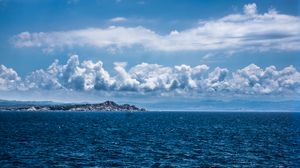 Preview wallpaper rocks, mountains, sea, horizon, sky
