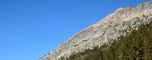 Preview wallpaper rocks, mountains, slope, trees, river