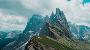 Preview wallpaper rocks, mountains, slope, grass, sky