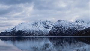 Preview wallpaper rocks, mountains, snow, snowy, water, reflection