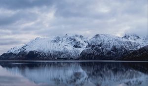 Preview wallpaper rocks, mountains, snow, snowy, water, reflection