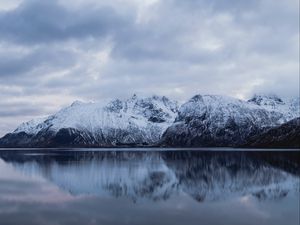 Preview wallpaper rocks, mountains, snow, snowy, water, reflection