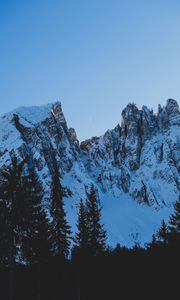 Preview wallpaper rocks, mountains, snow, snowy, spruce, moon