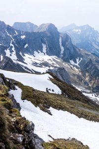 Preview wallpaper rocks, mountains, snow, snowy, stones, slope