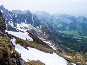 Preview wallpaper rocks, mountains, snow, snowy, stones, slope