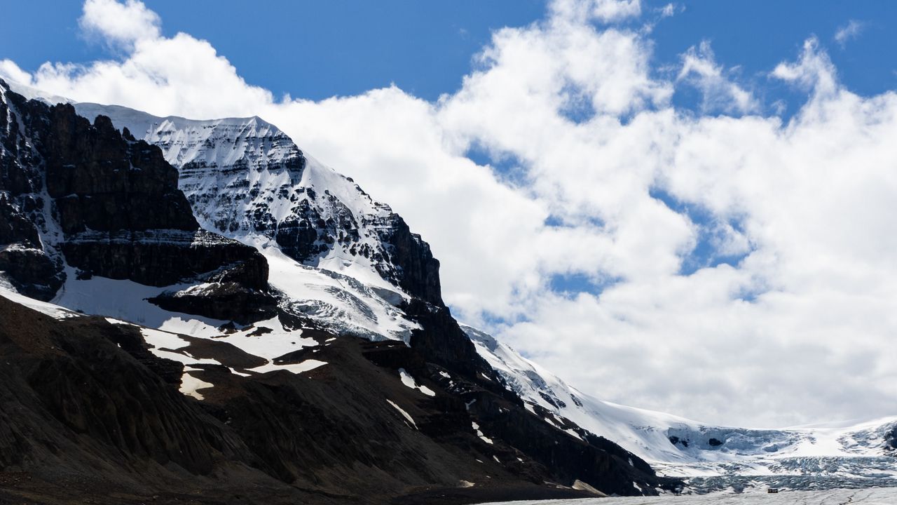 Wallpaper rocks, mountains, snow, snowy, stones, sky