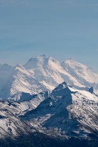 Preview wallpaper rocks, mountains, snow, snowy, sky