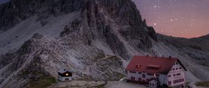 Preview wallpaper rocks, mountains, starry sky, house, night