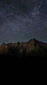 Preview wallpaper rocks, mountains, starry sky, stars, night