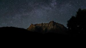 Preview wallpaper rocks, mountains, starry sky, stars, night