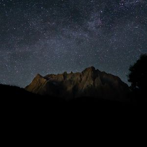 Preview wallpaper rocks, mountains, starry sky, stars, night
