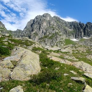 Preview wallpaper rocks, mountains, stones, grass, sky, landscape