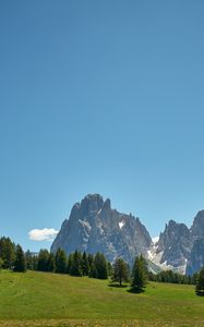 Preview wallpaper rocks, mountains, trees, grass, sky