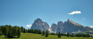 Preview wallpaper rocks, mountains, trees, grass, sky