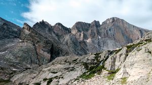 Preview wallpaper rocks, mountains, valley, grass, stones