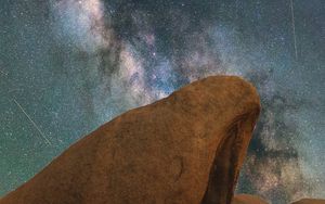 Preview wallpaper rocks, nebula, starry sky, stars, space, starfall