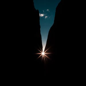 Preview wallpaper rocks, night, rays, light