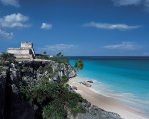 Preview wallpaper rocks, palm trees, structure, stone, architecture, break, blue water