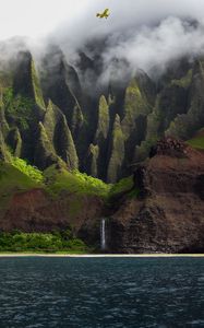 Preview wallpaper rocks, plane, waterfall, fog, water