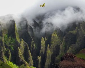 Preview wallpaper rocks, plane, waterfall, fog, water