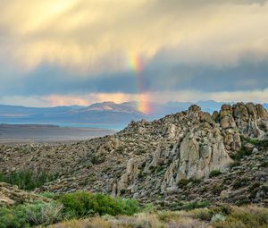 Preview wallpaper rocks, relief, clouds, rainbow, landscape