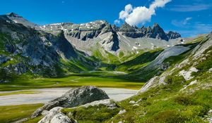 Preview wallpaper rocks, relief, grass, valley, sky