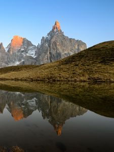 Preview wallpaper rocks, relief, lake, hill, reflection
