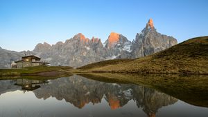 Preview wallpaper rocks, relief, lake, hill, reflection