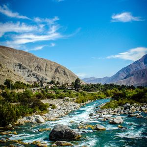 Preview wallpaper rocks, river, mountains, stones, stream, landscape