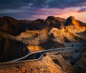 Preview wallpaper rocks, road, cars, mountains