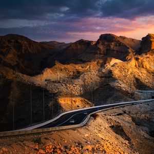 Preview wallpaper rocks, road, cars, mountains