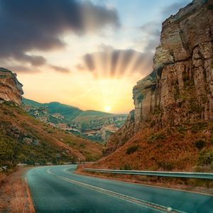 Preview wallpaper rocks, road, sun, sunrise