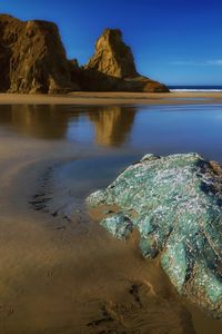 Preview wallpaper rocks, sand, coast, sea, landscape, nature