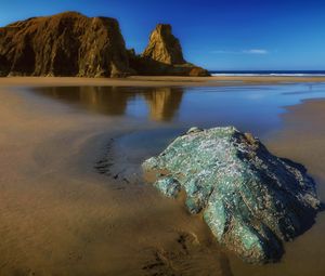 Preview wallpaper rocks, sand, coast, sea, landscape, nature