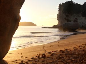 Preview wallpaper rocks, sand, footprints, sea, waves