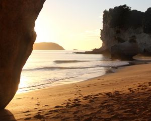 Preview wallpaper rocks, sand, footprints, sea, waves