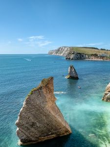 Preview wallpaper rocks, sea, boats, landscape, sky