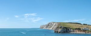 Preview wallpaper rocks, sea, boats, landscape, sky