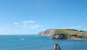 Preview wallpaper rocks, sea, boats, landscape, sky